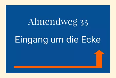 Wegweiser Almendweg 33 Eingang um die Ecke Bild