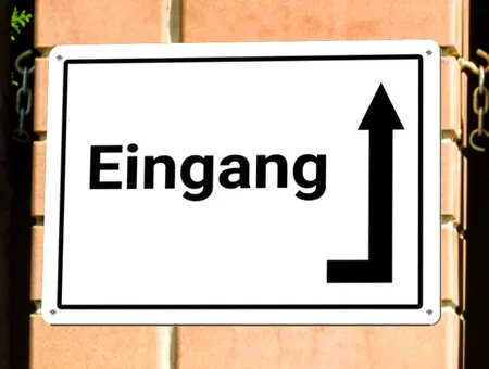 Wegweiser Eingang um die Ecke Bild