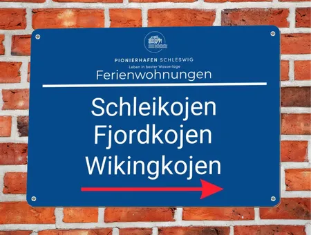Wegweiser Ferienwohnungen Bild