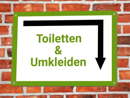 Wegweiser Toiletten & Umkleiden Bild